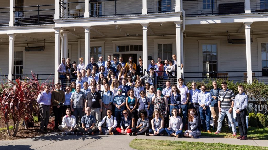 51 Pegasi b fellows stand outside smiling at camera.