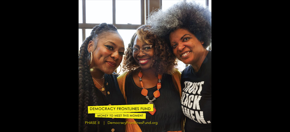 Three women smiling at camera with "Democracy Frontlines Fund" branding at the bottom of the photo.